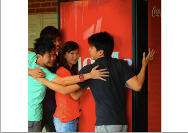 'Coca-Cola hug machine' spreads happiness in Singapore