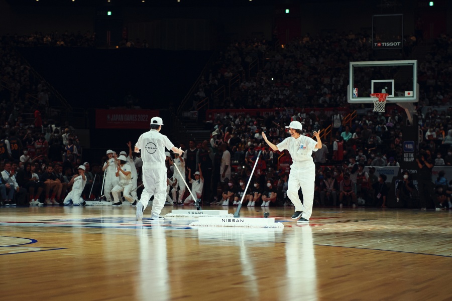 The star of this half-time basketball show is…. a cleaning equipment
