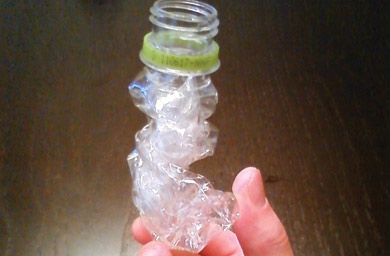 What are the benefits of hiding environmental initiatives aka 'green blushing'?