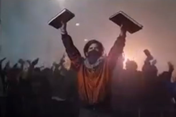 Power of reading triumphs over riot police in bookstore ad