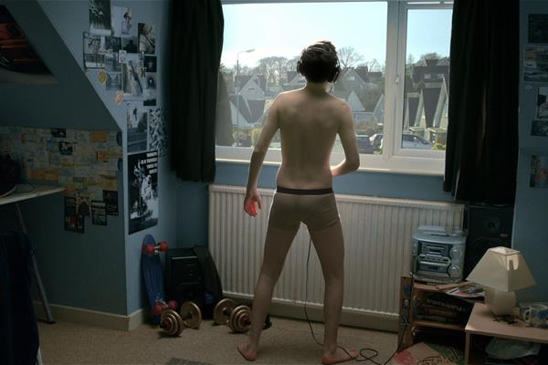 Is this young man doing what you think he's doing?