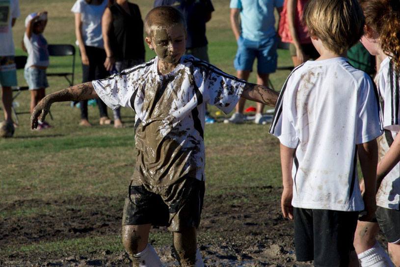 Twisted football match seeks to prove getting dirty is more fun