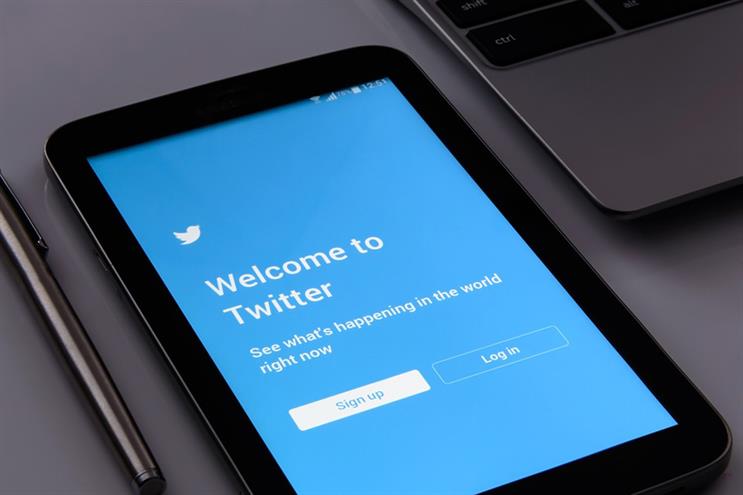 Twitter reports ad revenue up 21%, but warns of tougher months ahead